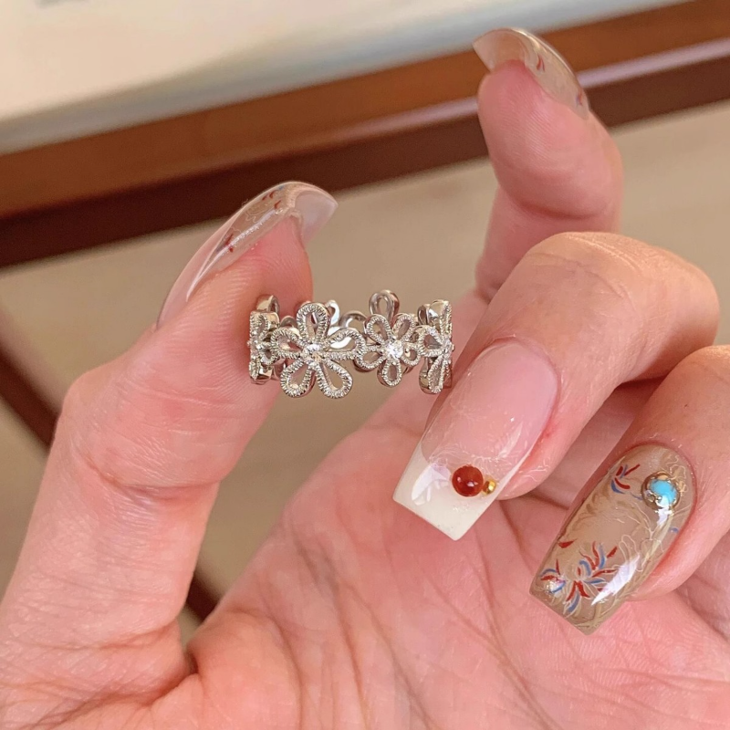 Adjustable Lace Hollow Five-Petal Flower Ring for Women - Japanese & Korean Style, Simple Versatile Design, Sweet Niche Jewelry Adjustable Lace Hollow Five-Petal Flower Ring for Women - Japanese & Korean Style, Simple Versatile Design, Sweet Niche Jewelry