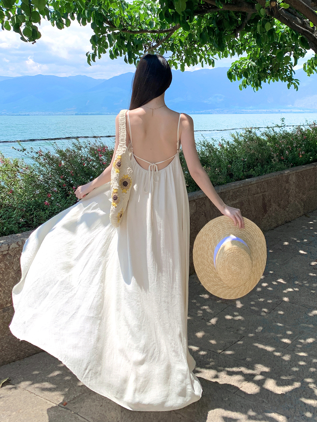 Bright Island Style Backless Dress with Irregular Lace Splicing and Spaghetti Straps, Perfect for Seaside Vacation Bright Island Style Backless Dress with Irregular Lace Splicing and Spaghetti Straps, Perfect for Seaside Vacation