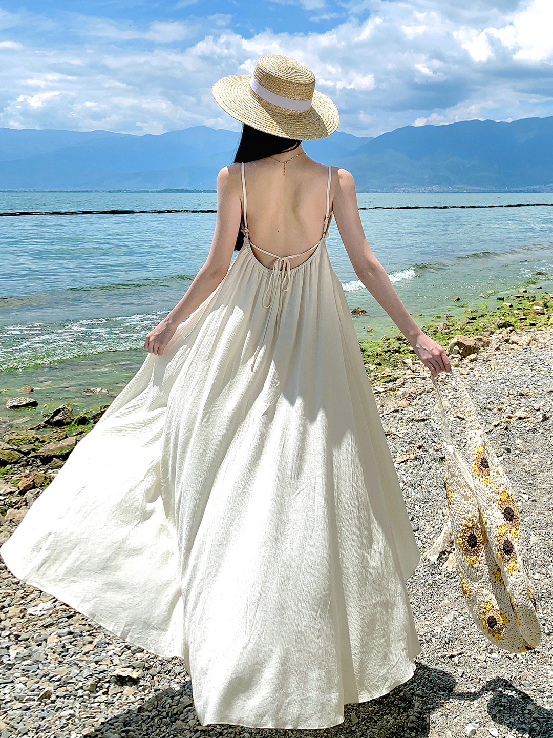 Bright Island Style Backless Dress with Irregular Lace Splicing and Spaghetti Straps, Perfect for Seaside Vacation Bright Island Style Backless Dress with Irregular Lace Splicing and Spaghetti Straps, Perfect for Seaside Vacation