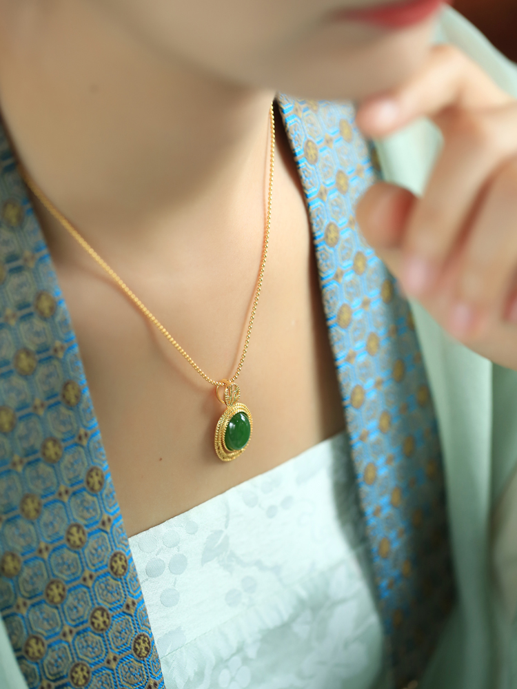 Chinese Style Natural Hetian Jade Green Water Droplet Pendant Necklace with Silver Peace Buckle and Gold Inlaid Design for Women Chinese Style Natural Hetian Jade Green Water Droplet Pendant Necklace with Silver Peace Buckle and Gold Inlaid Design for Women