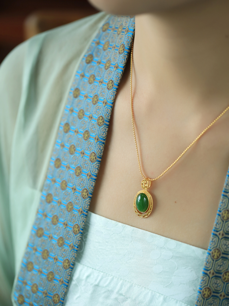 Chinese Style Natural Hetian Jade Green Water Droplet Pendant Necklace with Silver Peace Buckle and Gold Inlaid Design for Women Chinese Style Natural Hetian Jade Green Water Droplet Pendant Necklace with Silver Peace Buckle and Gold Inlaid Design for Women