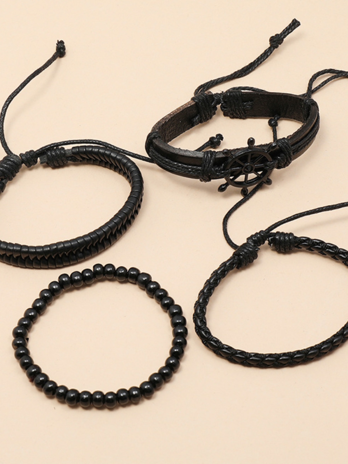 DIY Handmade Woven Black Leather Bracelet Set - Vintage Four-Piece Steering Wheel Accessories for European and American Style DIY Handmade Woven Black Leather Bracelet Set - Vintage Four-Piece Steering Wheel Accessories for European and American Style