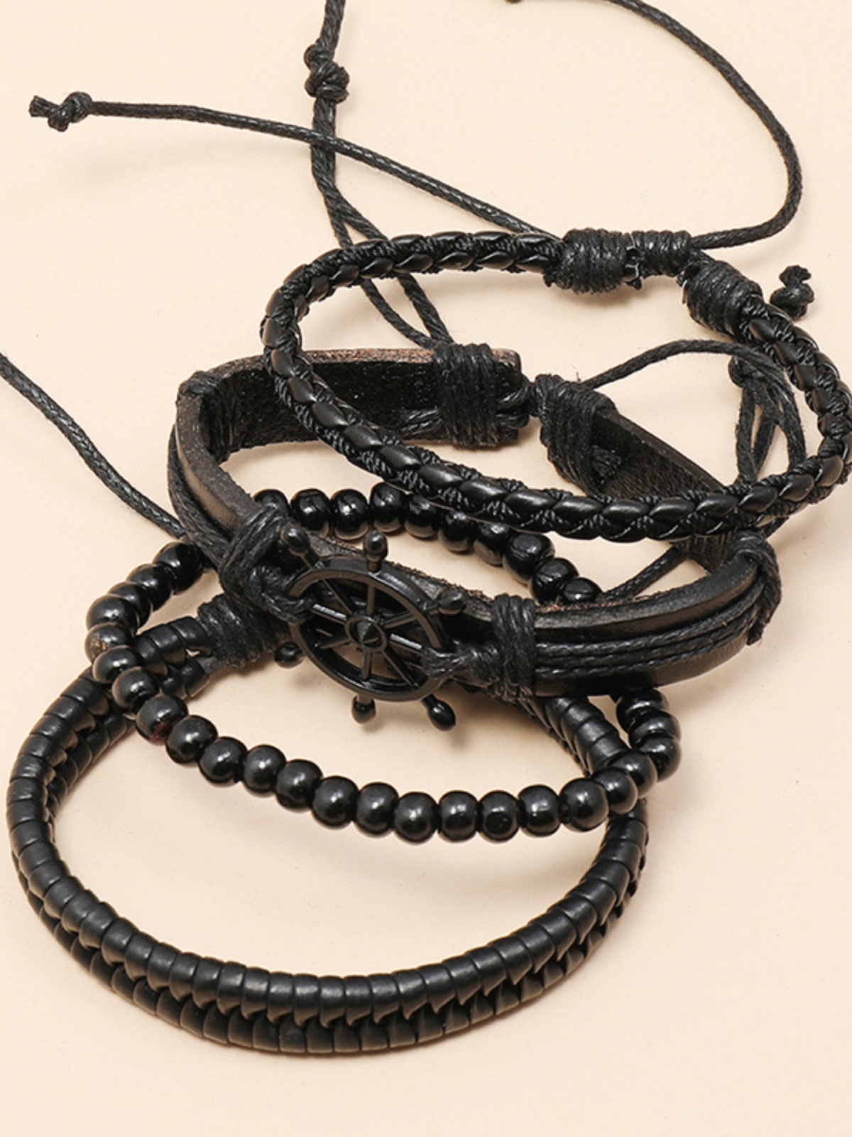 DIY Handmade Woven Black Leather Bracelet Set - Vintage Four-Piece Steering Wheel Accessories for European and American Style DIY Handmade Woven Black Leather Bracelet Set - Vintage Four-Piece Steering Wheel Accessories for European and American Style