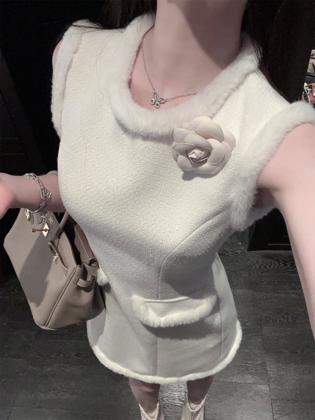 Eco-Friendly White Woolen Short Dress with Waist-Cinching Sleeveless Design and Floral Accents for Winter Fashion Eco-Friendly White Woolen Short Dress with Waist-Cinching Sleeveless Design and Floral Accents for Winter Fashion