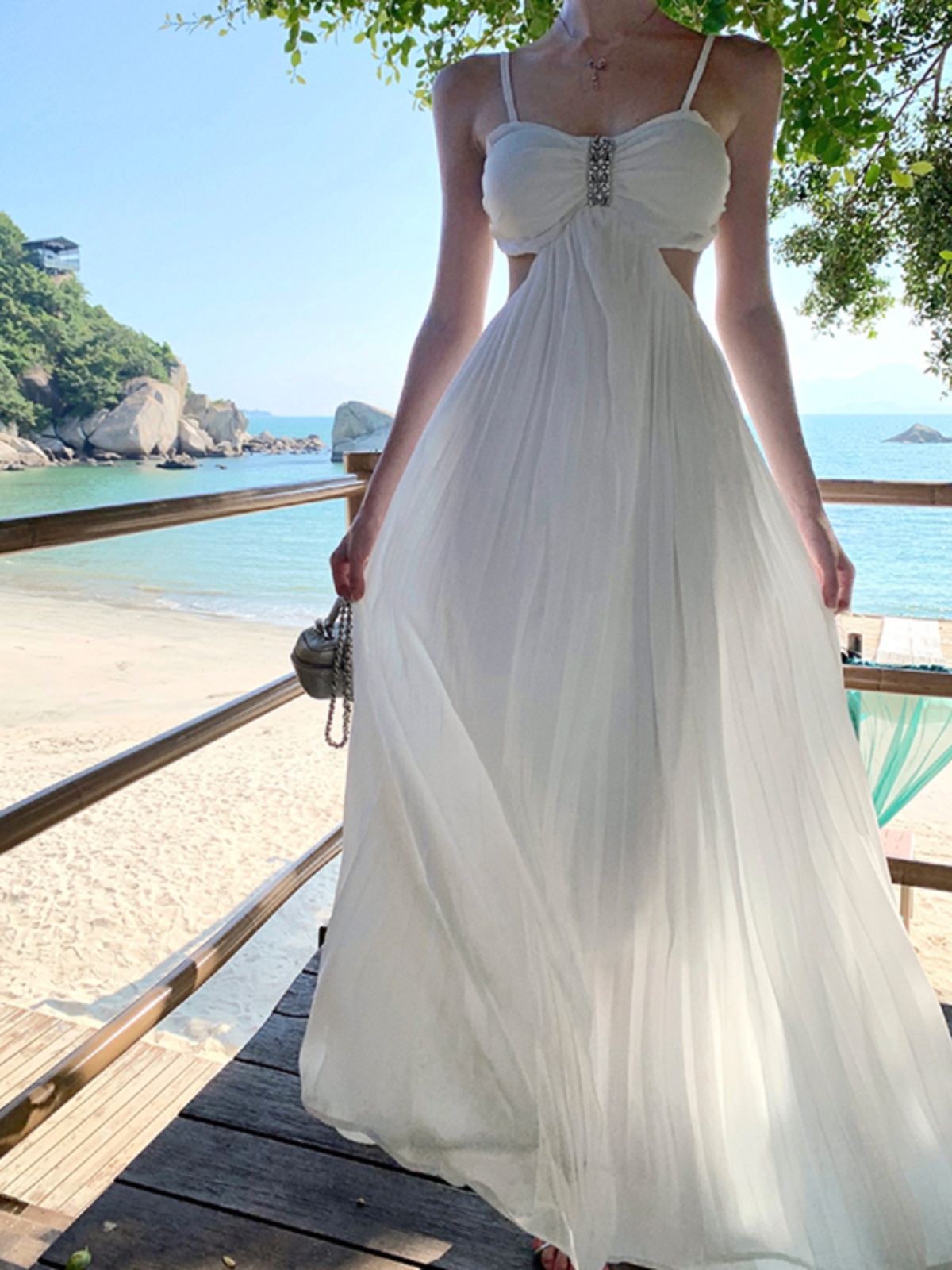 Elegant Backless White Spaghetti Strap Long Dress for Beach Vacation - Slimming, Height-Enhancing, Flowing Design, Perfect for Summer Events Elegant Backless White Spaghetti Strap Long Dress for Beach Vacation - Slimming, Height-Enhancing, Flowing Design, Perfect for Summer Events