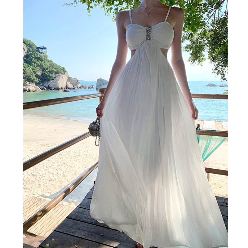 Elegant Backless White Spaghetti Strap Long Dress for Beach Vacation - Slimming, Height-Enhancing, Flowing Design, Perfect for Summer Events
