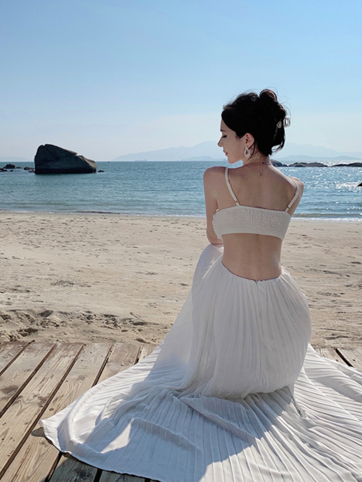 Elegant Backless White Spaghetti Strap Long Dress for Beach Vacation - Slimming, Height-Enhancing, Flowing Design, Perfect for Summer Events Elegant Backless White Spaghetti Strap Long Dress for Beach Vacation - Slimming, Height-Enhancing, Flowing Design, Perfect for Summer Events