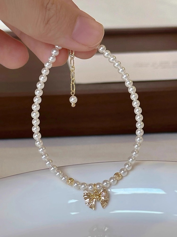 Elegant French Bow Pearl Bracelet - Classy High-End Accessory with Designer Touch for Chic Style Elegant French Bow Pearl Bracelet - Classy High-End Accessory with Designer Touch for Chic Style