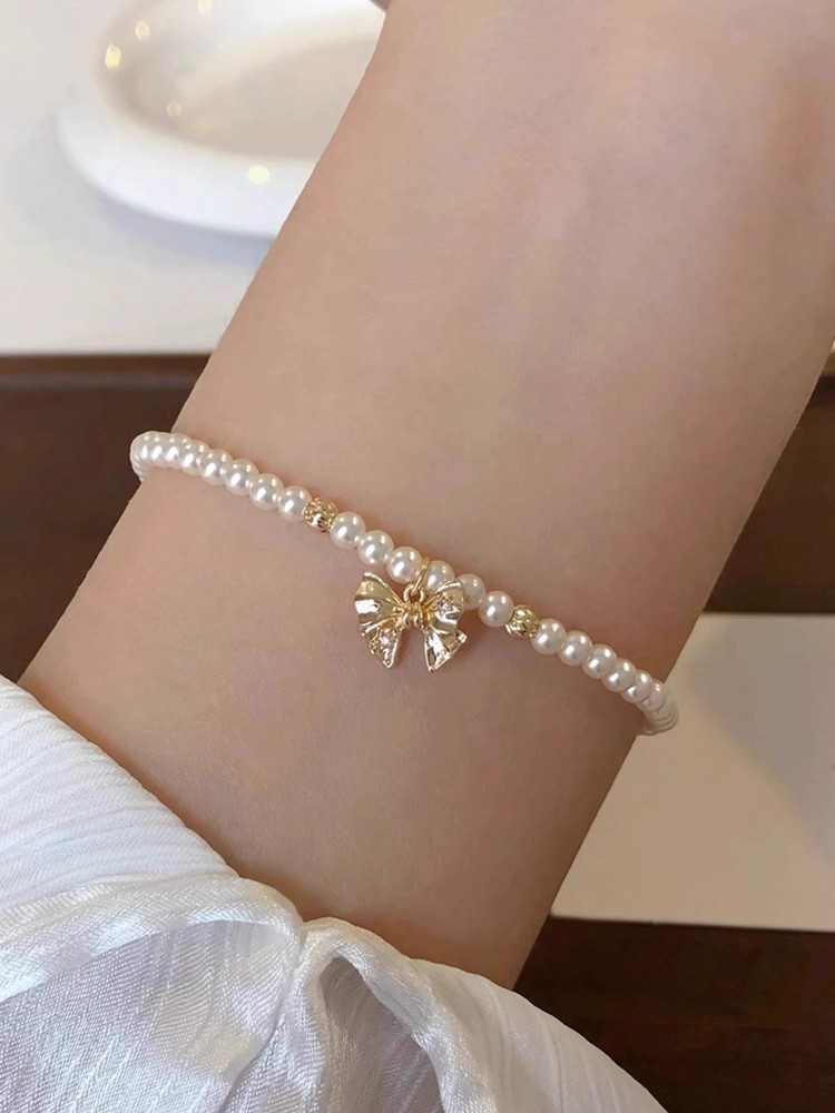 Elegant French Bow Pearl Bracelet - Classy High-End Accessory with Designer Touch for Chic Style Elegant French Bow Pearl Bracelet - Classy High-End Accessory with Designer Touch for Chic Style