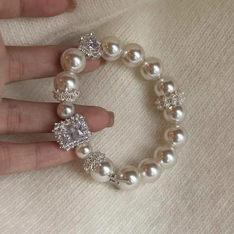 Elegant French Pearl Bracelet for Women with Purple Rock Candy Heart Bow Charm - Classy Fashion Accessory