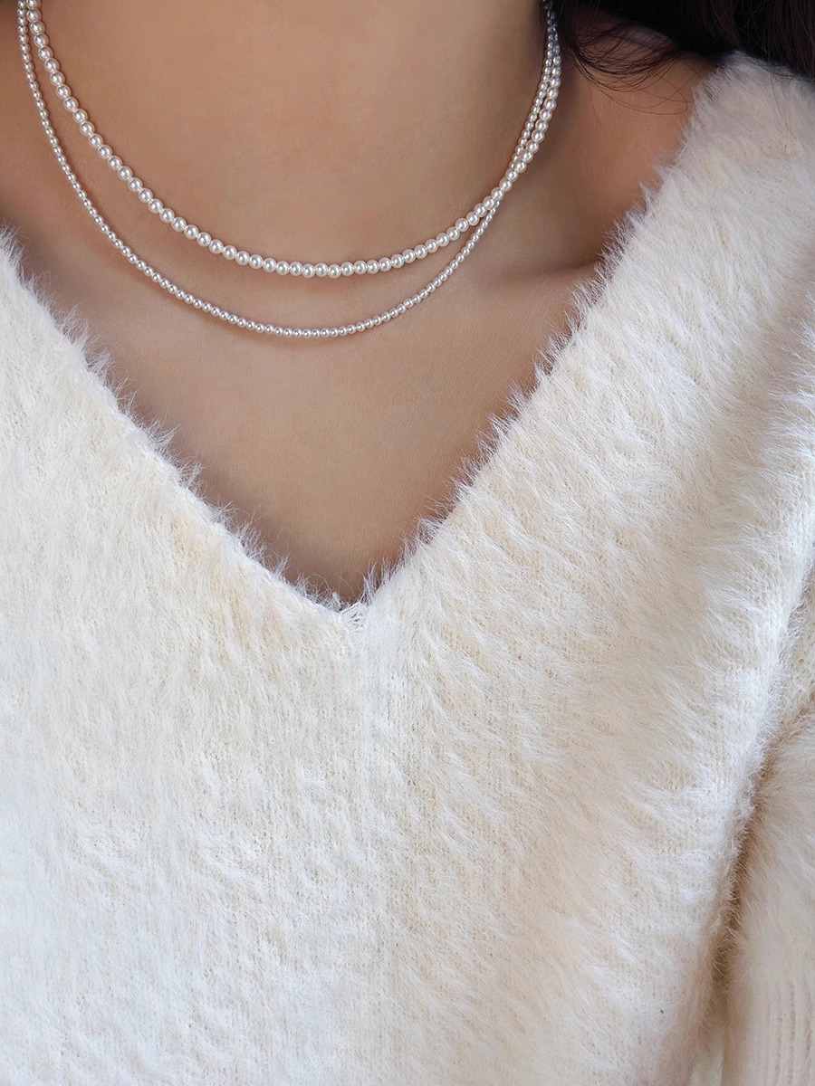 Elegant Layered Pearl Necklace - Light Luxury Collarbone Chain Accessory, French Design, Perfect for Stylish Layering and Chic Looks
