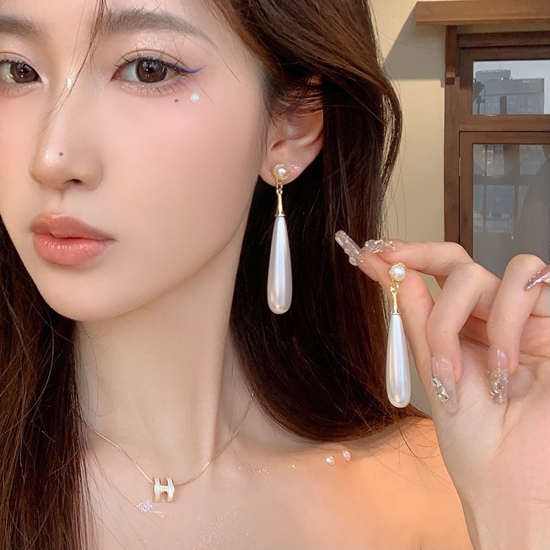 Elegant Light Luxury Pearl Stud Earrings with Tassels - 2025 Trendy Long Water Drop Accessories for Sophisticated Style