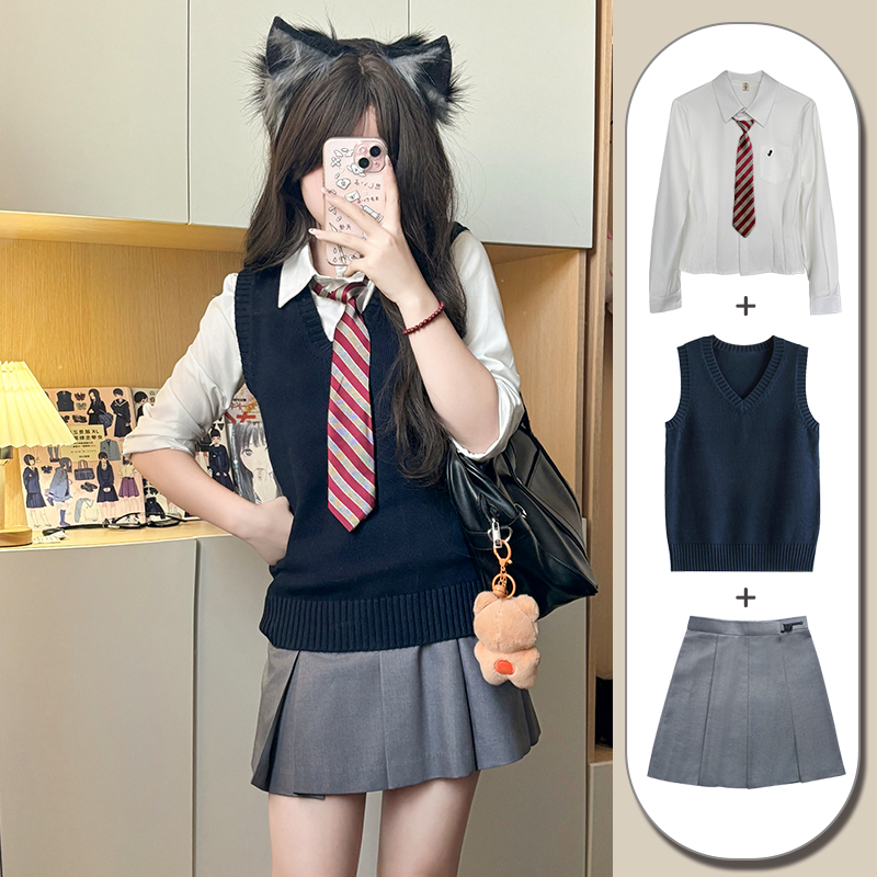 Four-Piece Women's JK Uniform Set: Pudding Bear Shirt, Sweater Vest, Skirt - Japanese College Style for Autumn & Winter Four-Piece Women's JK Uniform Set: Pudding Bear Shirt, Sweater Vest, Skirt - Japanese College Style for Autumn & Winter