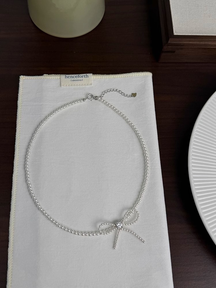 French Pearl Woven Bow Necklace for Women, Light Luxury Silver Collarbone Chain, Elegant Jewelry for Special Occasions