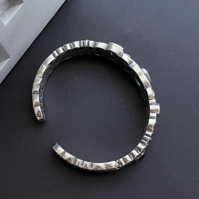 Hollow Carved Blue Topaz Bracelet for Women - Vintage Retro 2025 High-End Jewelry, Exquisite Versatile Design Hollow Carved Blue Topaz Bracelet for Women - Vintage Retro 2025 High-End Jewelry, Exquisite Versatile Design