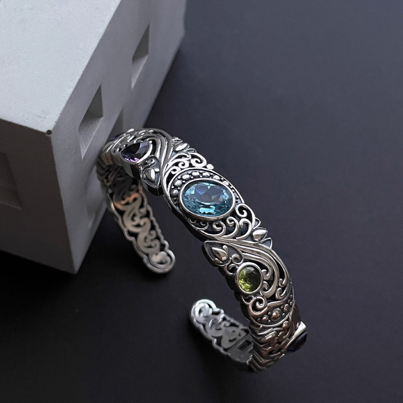 Hollow Carved Blue Topaz Bracelet for Women - Vintage Retro 2025 High-End Jewelry, Exquisite Versatile Design Hollow Carved Blue Topaz Bracelet for Women - Vintage Retro 2025 High-End Jewelry, Exquisite Versatile Design