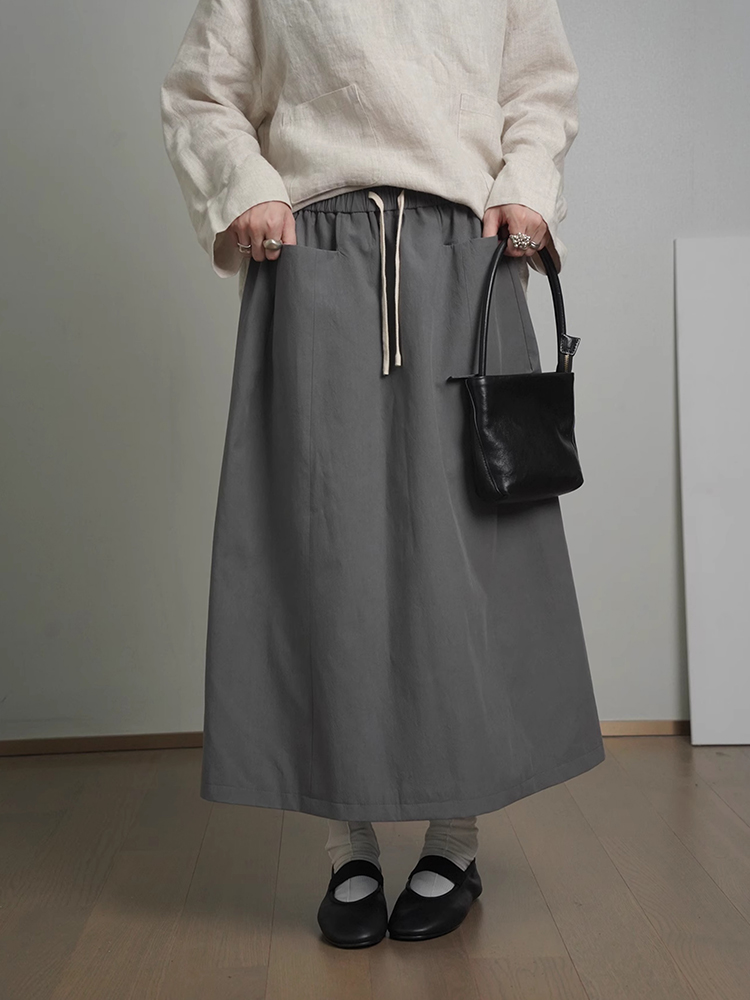 Japanese-Style High-Waisted Elastic Pocket Midi Skirt for Women - Loose A-Line Casual Summer 2025 Fashion for Petite Sizes Japanese-Style High-Waisted Elastic Pocket Midi Skirt for Women - Loose A-Line Casual Summer 2025 Fashion for Petite Sizes