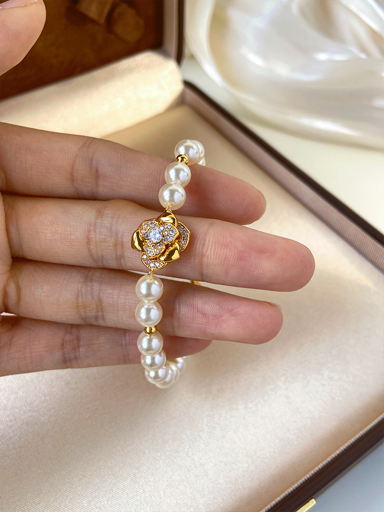 Light Luxury French-Style Zircon Flower Bracelet for Women with Sijia Pearls and Golden Floral Design Light Luxury French-Style Zircon Flower Bracelet for Women with Sijia Pearls and Golden Floral Design