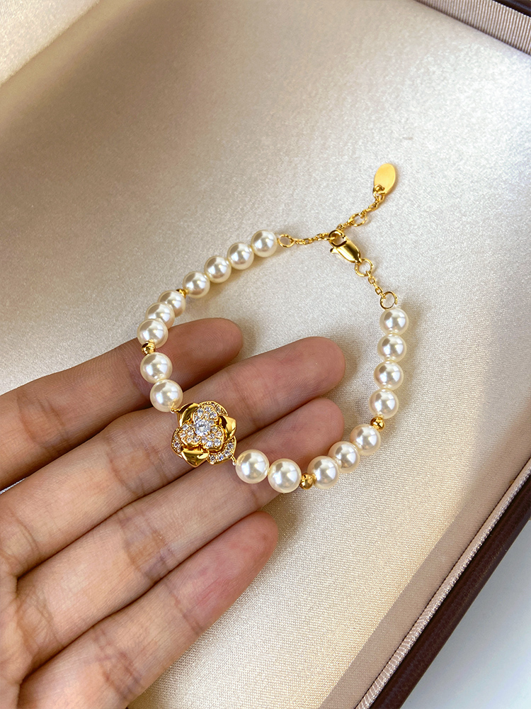 Light Luxury French-Style Zircon Flower Bracelet for Women with Sijia Pearls and Golden Floral Design Light Luxury French-Style Zircon Flower Bracelet for Women with Sijia Pearls and Golden Floral Design