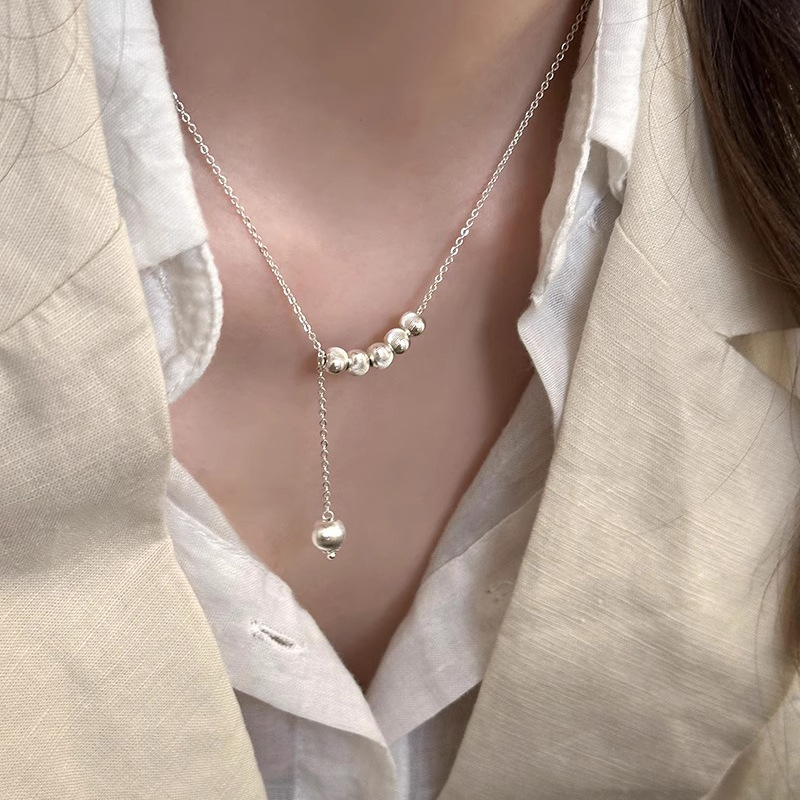 Luminous Metal Cat Eye Round Ball Necklace for Women - Clavicle Chain, Light Luxury Niche Design Neck Accessory, Trendy 2025 Style Luminous Metal Cat Eye Round Ball Necklace for Women - Clavicle Chain, Light Luxury Niche Design Neck Accessory, Trendy 2025 Style