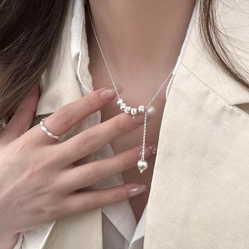 Luminous Metal Cat Eye Round Ball Necklace for Women - Clavicle Chain, Light Luxury Niche Design Neck Accessory, Trendy 2025 Style Luminous Metal Cat Eye Round Ball Necklace for Women - Clavicle Chain, Light Luxury Niche Design Neck Accessory, Trendy 2025 Style