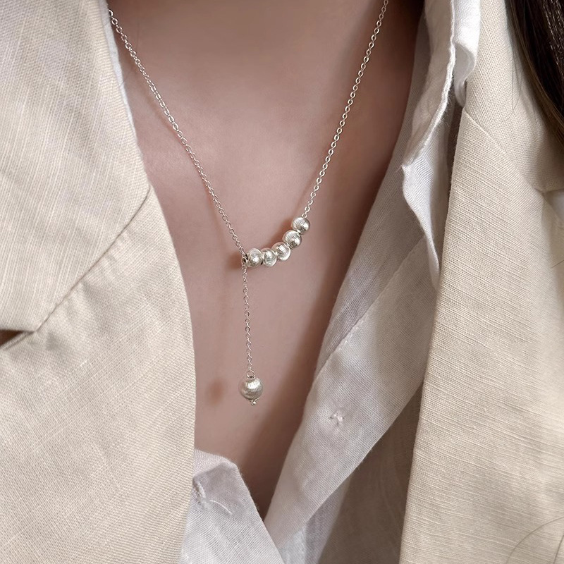 Luminous Metal Cat Eye Round Ball Necklace for Women - Clavicle Chain, Light Luxury Niche Design Neck Accessory, Trendy 2025 Style Luminous Metal Cat Eye Round Ball Necklace for Women - Clavicle Chain, Light Luxury Niche Design Neck Accessory, Trendy 2025 Style