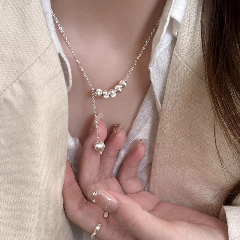 Luminous Metal Cat Eye Round Ball Necklace for Women - Clavicle Chain, Light Luxury Niche Design Neck Accessory, Trendy 2025 Style Luminous Metal Cat Eye Round Ball Necklace for Women - Clavicle Chain, Light Luxury Niche Design Neck Accessory, Trendy 2025 Style