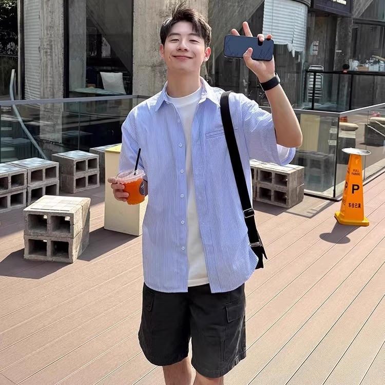 Men's Short-Sleeve Casual Shirt - Trendy Summer Jacket in Loose Fit, Stylish Hong Kong Design for Effortless Fashion Men's Short-Sleeve Casual Shirt - Trendy Summer Jacket in Loose Fit, Stylish Hong Kong Design for Effortless Fashion