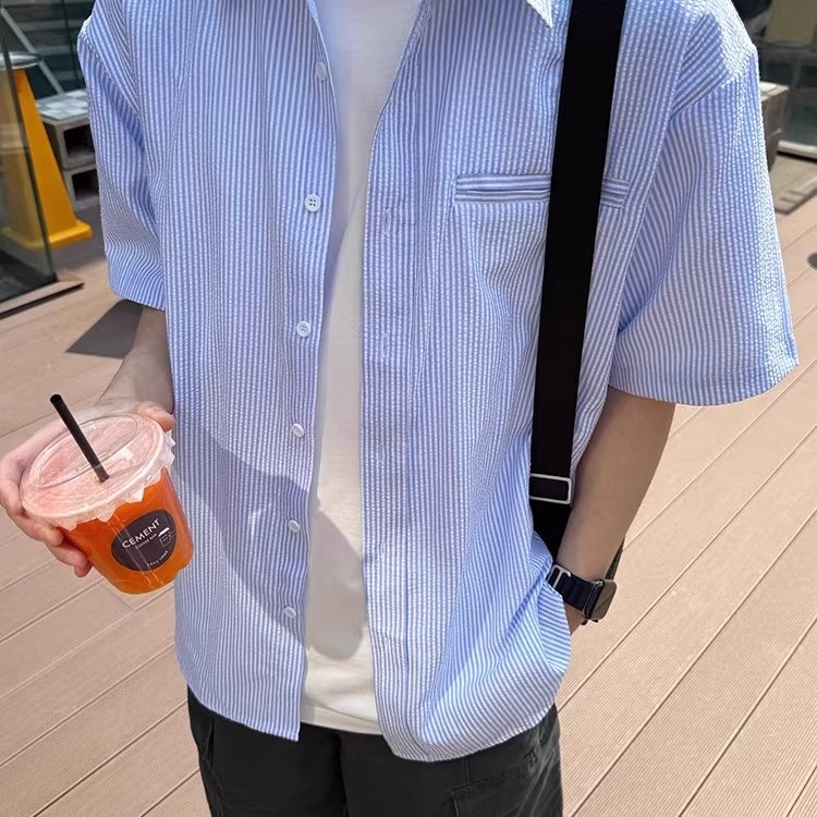 Men's Short-Sleeve Casual Shirt - Trendy Summer Jacket in Loose Fit, Stylish Hong Kong Design for Effortless Fashion Men's Short-Sleeve Casual Shirt - Trendy Summer Jacket in Loose Fit, Stylish Hong Kong Design for Effortless Fashion