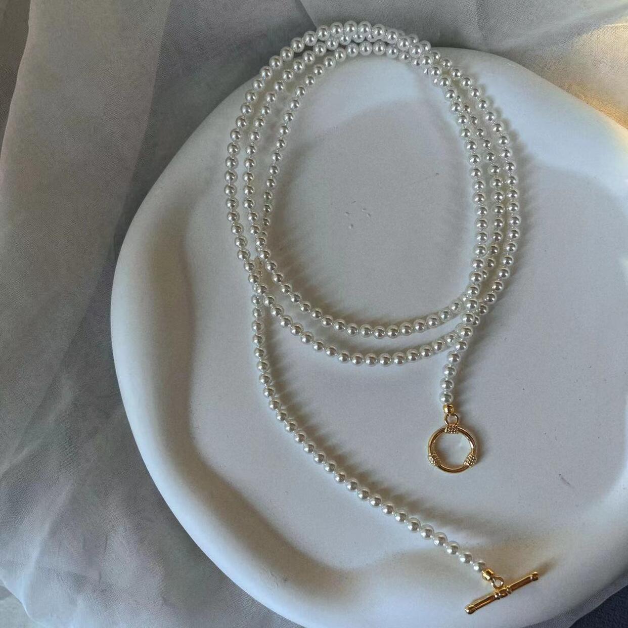 Minimalist Double-Layer Long OT Buckle Pearl Collar Chain Necklace - Chic Niche Fashion Accessory for Elevated Style