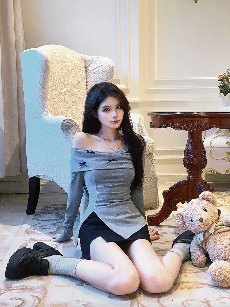 Off-Shoulder Bow Tie Top and Slim Fit Short Skirt Set for Women - Sweet and Spicy Spring Fashion with Long Sleeves Off-Shoulder Bow Tie Top and Slim Fit Short Skirt Set for Women - Sweet and Spicy Spring Fashion with Long Sleeves