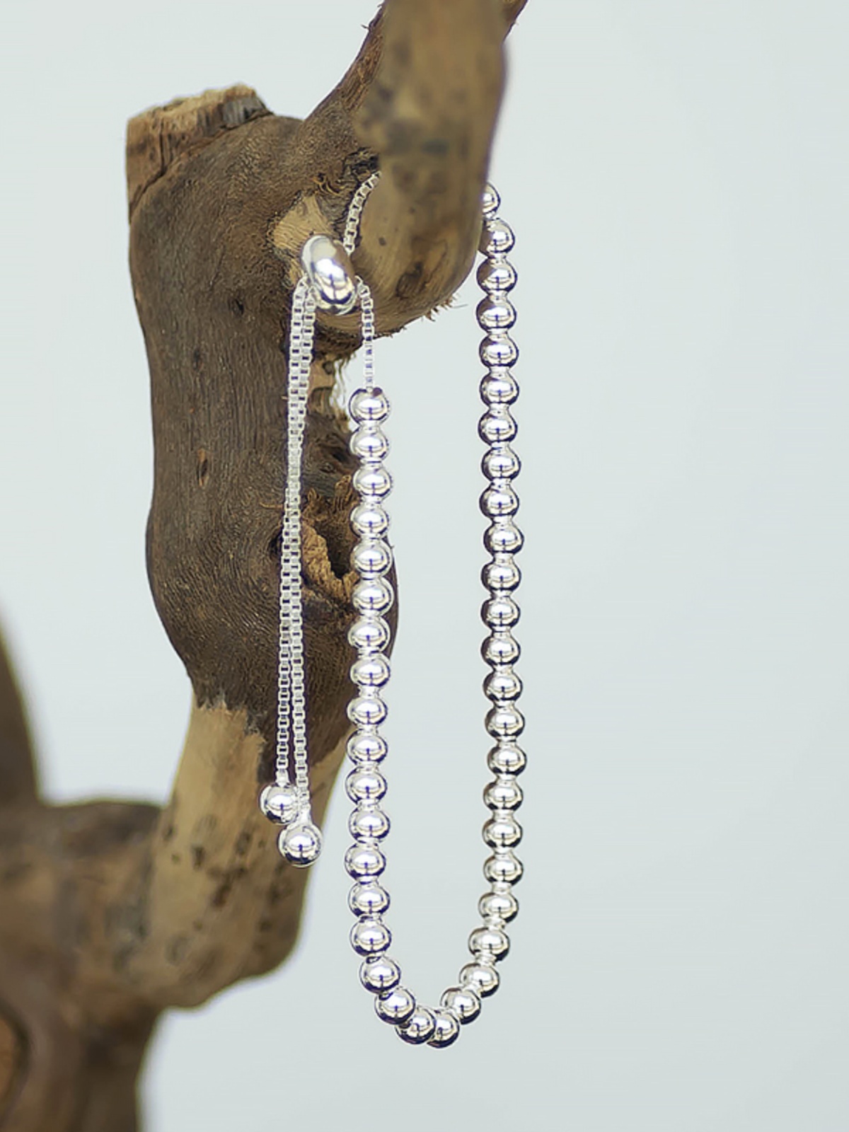 Pure Silver S925 Light Luxury Bead Pull Bracelet for Women - Simple Smooth Silver Bean Tassel, Retro Style, Niche Design Pure Silver S925 Light Luxury Bead Pull Bracelet for Women - Simple Smooth Silver Bean Tassel, Retro Style, Niche Design