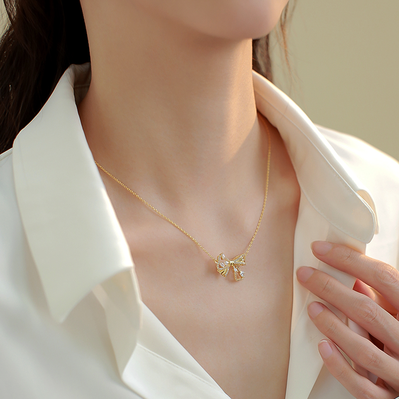 Trendy Double-Layer Bow Pendant Pearl Necklace for Women - Elegant Niche Design Clavicle Chain 2025 Trendy Double-Layer Bow Pendant Pearl Necklace for Women - Elegant Niche Design Clavicle Chain 2025