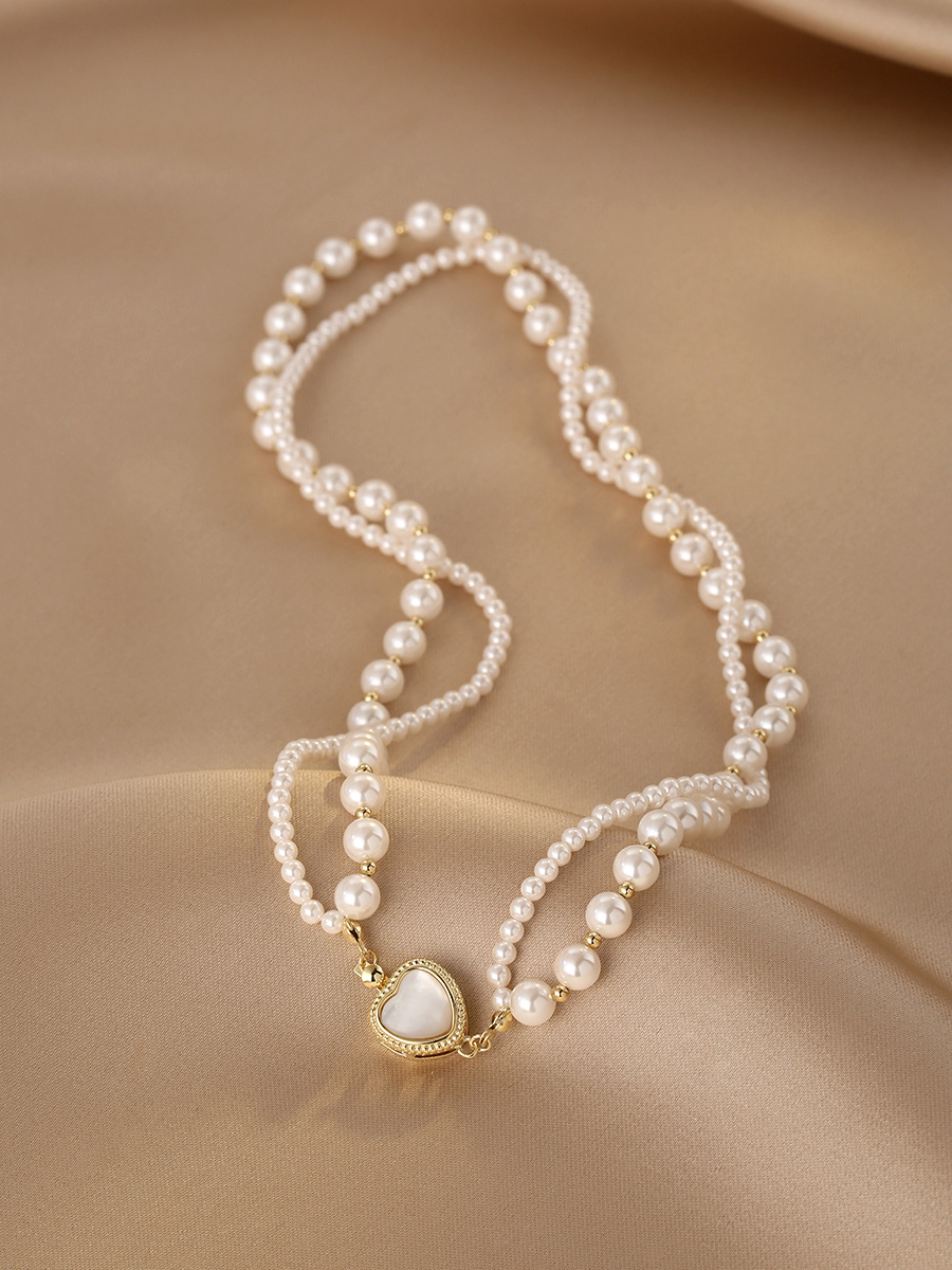 Twisted Double-Layered Pearl Necklace for Women, Heart-Shaped Clavicle Chain, Light Luxury High-End Sweater Accessory Twisted Double-Layered Pearl Necklace for Women, Heart-Shaped Clavicle Chain, Light Luxury High-End Sweater Accessory